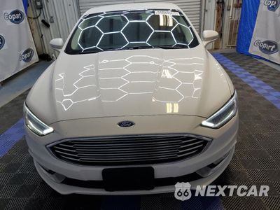 Piąte zdjęcie samochodu w środku: 2017 FORD FUSION SE HYBRID VIN:3FA6P0LU8HR409501 - miniatura
