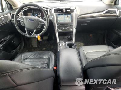 Zdjęcie 8 z 13 samochodu: 2017 FORD FUSION SE HYBRID VIN:3FA6P0LUXHR409063 - miniatura