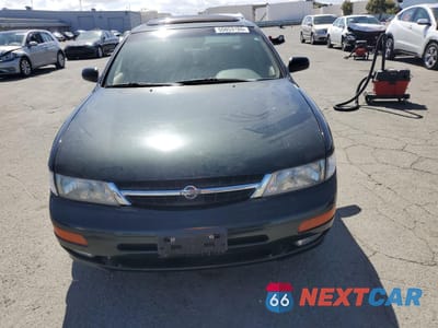 Piąte zdjęcie samochodu w środku: 1999 NISSAN MAXIMA GLE VIN:JN1CA21D3XT809866 - miniatura