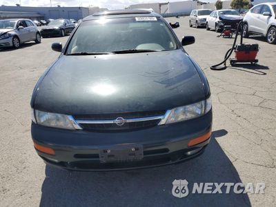 Piąte zdjęcie samochodu w środku: 1999 NISSAN MAXIMA GLE VIN:JN1CA21D3XT809866 - miniatura