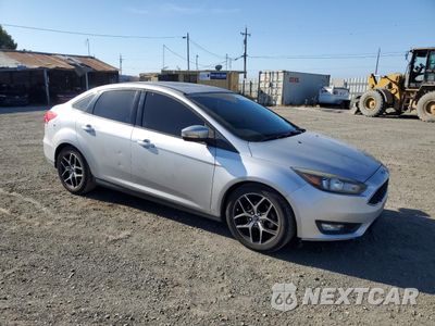 Czwarte zdjęcie samochodu z boku: 2017 FORD FOCUS SEL VIN:1FADP3H28HL223231 - miniatura