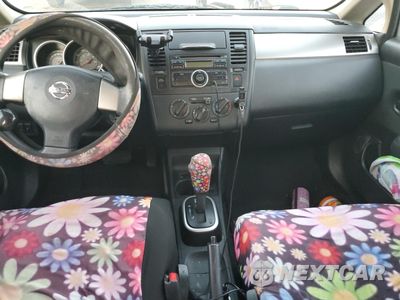 Zdjęcie 8 z 12 samochodu: 2011 NISSAN VERSA S VIN:3N1BC1CP1BL503737 - miniatura