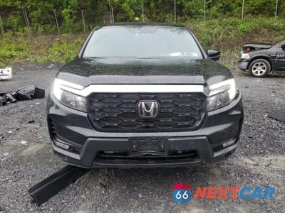 Piąte zdjęcie samochodu w środku: 2023 HONDA PASSPORT EXL VIN:5FNYF8H55PB022183 - miniatura