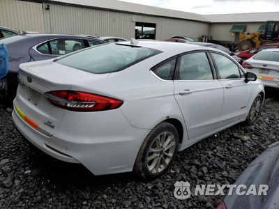 Trzecie zdjęcie samochodu z tyłu: 2019 FORD FUSION SE VIN:3FA6P0LU7KR184057 - miniatura