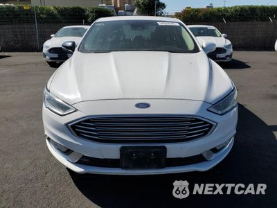 Piąte zdjęcie samochodu w środku: 2017 FORD FUSION SE HYBRID VIN:3FA6P0LU1HR408898 - miniatura