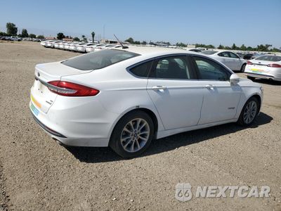 Trzecie zdjęcie samochodu z tyłu: 2017 FORD FUSION SE HYBRID VIN:3FA6P0LU0HR408911 - miniatura