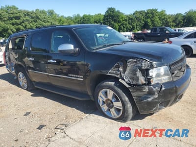 Czwarte zdjęcie samochodu z boku: 2012 CHEVROLET SUBURBAN C1500 LTZ VIN:1GNSCKE05CR287394 - miniatura