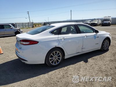 Trzecie zdjęcie samochodu z tyłu: 2017 FORD FUSION SE HYBRID VIN:3FA6P0LU2HR409378 - miniatura