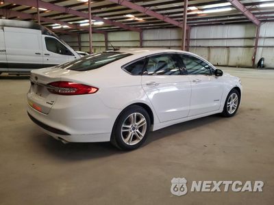 Trzecie zdjęcie samochodu z tyłu: 2018 FORD FUSION SE HYBRID VIN:3FA6P0LU2JR278684 - miniatura