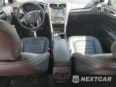 Zdjęcie 8 z 12 samochodu: 2017 FORD FUSION SE HYBRID VIN:3FA6P0LU6HR409416 - miniatura