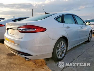 Trzecie zdjęcie samochodu z tyłu: 2017 FORD FUSION SE HYBRID VIN:3FA6P0LU7HR409649 - miniatura