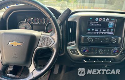 Zdjęcie 9 z 10 samochodu: 2017 CHEVROLET SILVERADO K1500 LT VIN:3GCUKREC5HG335524 - miniatura
