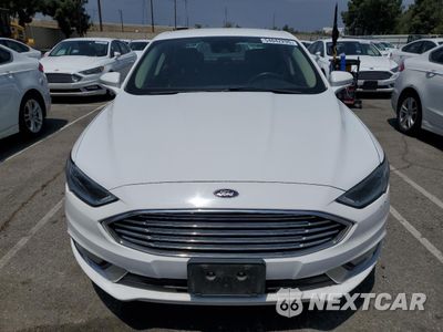 Piąte zdjęcie samochodu w środku: 2017 FORD FUSION SE HYBRID VIN:3FA6P0LU8HR408946 - miniatura