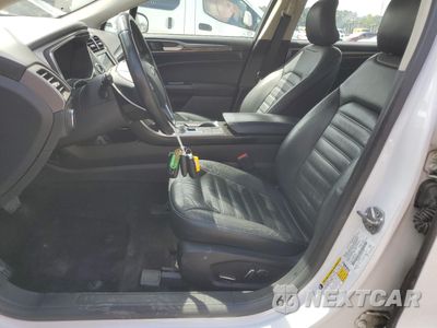 Zdjęcie 7 z 12 samochodu: 2017 FORD FUSION SE HYBRID VIN:3FA6P0LU4HR409527 - miniatura