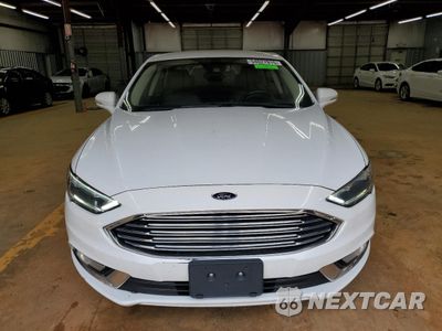 Piąte zdjęcie samochodu w środku: 2017 FORD FUSION SE HYBRID VIN:3FA6P0LU6HR410033 - miniatura