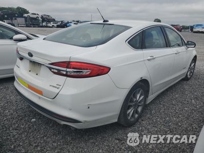 Trzecie zdjęcie samochodu z tyłu: 2017 FORD FUSION SE HYBRID VIN:3FA6P0LU0HR410075 - miniatura