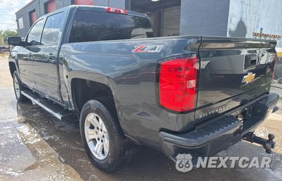 Trzecie zdjęcie samochodu z tyłu: 2017 CHEVROLET SILVERADO K1500 LT VIN:3GCUKREC5HG335524 - miniatura