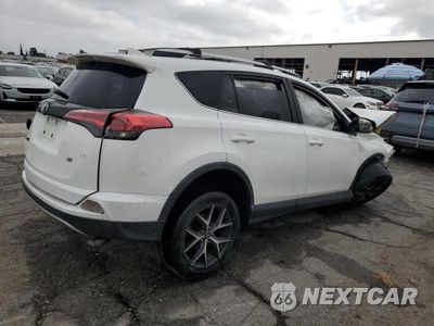 Trzecie zdjęcie samochodu z tyłu: 2018 TOYOTA RAV4 SE VIN:JTMNFREV7JJ725510 - miniatura