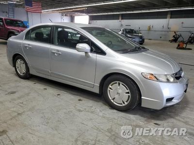 Czwarte zdjęcie samochodu z boku: 2009 HONDA CIVIC HYBRID VIN:JHMFA36289S018991 - miniatura