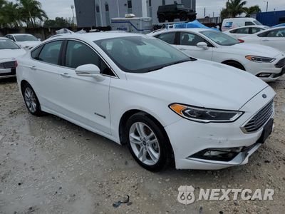 Czwarte zdjęcie samochodu z boku: 2017 FORD FUSION SE HYBRID VIN:3FA6P0LUXHR409466 - miniatura