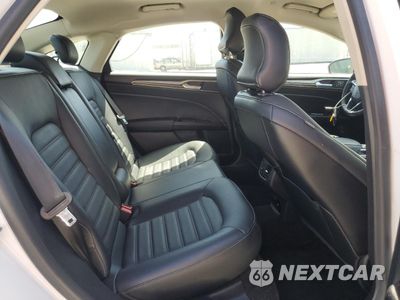 Zdjęcie 10 z 13 samochodu: 2018 FORD FUSION SE HYBRID VIN:3FA6P0LU3JR129832 - miniatura