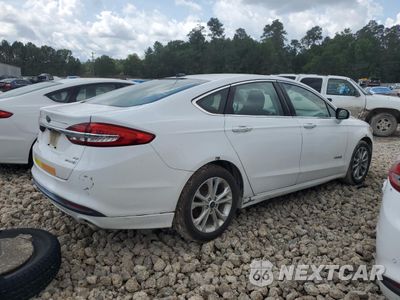 Trzecie zdjęcie samochodu z tyłu: 2017 FORD FUSION SE HYBRID VIN:3FA6P0LU0HR409427 - miniatura