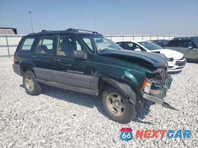 Czwarte zdjęcie samochodu z boku: 1997 JEEP GRAND CHEROKEE LAREDO VIN:1J4GZ58S0VC569017 - miniatura