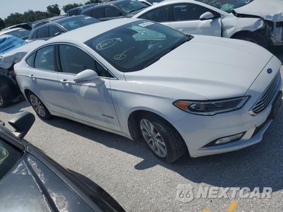 Czwarte zdjęcie samochodu z boku: 2017 FORD FUSION SE HYBRID VIN:3FA6P0LU3HR409647 - miniatura