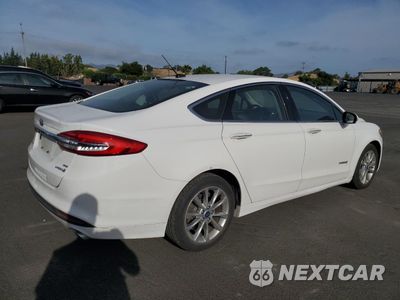 Trzecie zdjęcie samochodu z tyłu: 2017 FORD FUSION SE HYBRID VIN:3FA6P0LU7HR400711 - miniatura