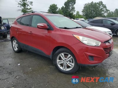 Czwarte zdjęcie samochodu z boku: 2012 HYUNDAI TUCSON GLS VIN:KM8JUCAC8CU529630 - miniatura