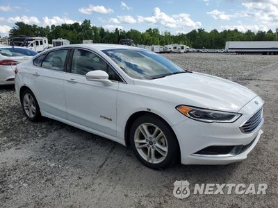 Czwarte zdjęcie samochodu z boku: 2018 FORD FUSION SE HYBRID VIN:3FA6P0LU7JR118798 - miniatura