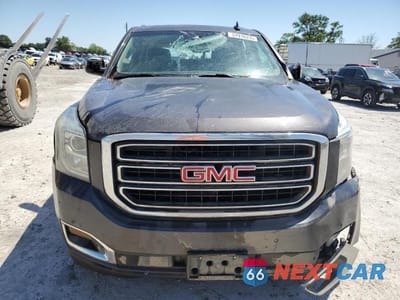 Piąte zdjęcie samochodu w środku: 2017 GMC YUKON SLT VIN:1GKS2BKC6HR338598 - miniatura