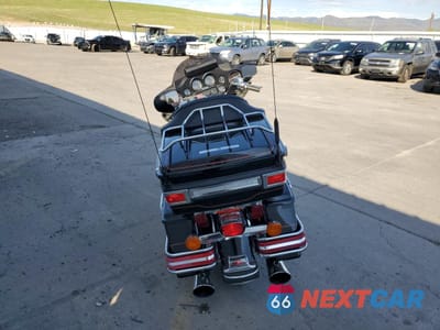 Czwarte zdjęcie samochodu z boku: 2000 HARLEY-DAVIDSON FLHTCUI VIN:1HD1FCW19YY612357 - miniatura