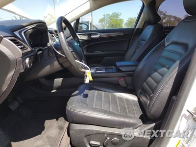Zdjęcie 7 z 12 samochodu: 2018 FORD FUSION SE HYBRID VIN:3FA6P0LU7JR278616 - miniatura