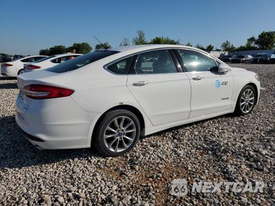 Trzecie zdjęcie samochodu z tyłu: 2017 FORD FUSION SE HYBRID VIN:3FA6P0LUXHR409449 - miniatura