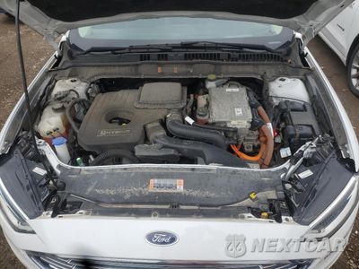Zdjęcie 11 z 12 samochodu: 2018 FORD FUSION SE HYBRID VIN:3FA6P0LU7JR118719 - miniatura