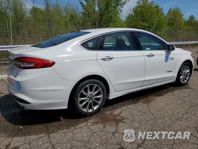 Trzecie zdjęcie samochodu z tyłu: 2017 FORD FUSION SE HYBRID VIN:3FA6P0LU0HR359645 - miniatura