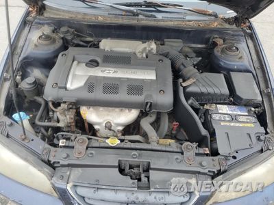 Zdjęcie 11 z 12 samochodu: 2005 HYUNDAI ELANTRA GLS VIN:KMHDN46D45U043207 - miniatura