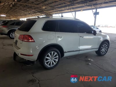 Trzecie zdjęcie samochodu z tyłu: 2012 VOLKSWAGEN TOUAREG V6 VIN:WVGEF9BP5CD009322 - miniatura