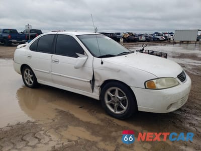 Czwarte zdjęcie samochodu z boku: 2001 NISSAN SENTRA SE VIN:3N1BB51D51L127383 - miniatura