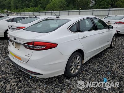Trzecie zdjęcie samochodu z tyłu: 2017 FORD FUSION SE HYBRID VIN:3FA6P0LU8HR409272 - miniatura