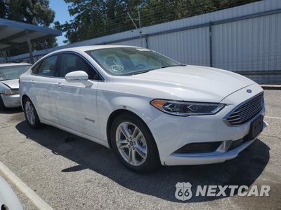 Czwarte zdjęcie samochodu z boku: 2018 FORD FUSION SE HYBRID VIN:3FA6P0LU6JR172139 - miniatura