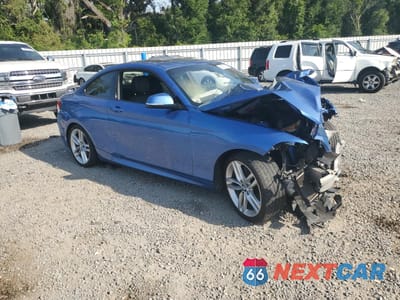 Czwarte zdjęcie samochodu z boku: 2014 BMW 228 I VIN:WBA1F5C56EV246159 - miniatura