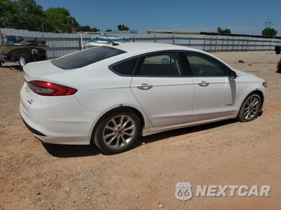 Trzecie zdjęcie samochodu z tyłu: 2017 FORD FUSION SE HYBRID VIN:3FA6P0LU9HR409121 - miniatura
