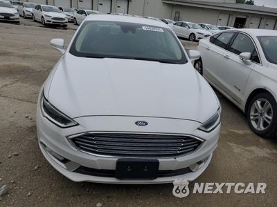 Piąte zdjęcie samochodu w środku: 2017 FORD FUSION SE HYBRID VIN:3FA6P0LU9HR409667 - miniatura