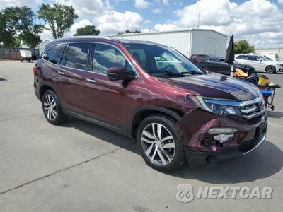 Czwarte zdjęcie samochodu z boku: 2017 HONDA PILOT TOURING VIN:5FNYF6H93HB034700 - miniatura