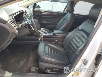 Zdjęcie 7 z 12 samochodu: 2017 FORD FUSION SE HYBRID VIN:3FA6P0LU3HR409471 - miniatura