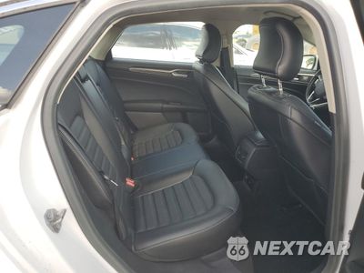 Zdjęcie 10 z 12 samochodu: 2017 FORD FUSION SE HYBRID VIN:3FA6P0LU6HR359598 - miniatura