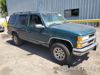 Czwarte zdjęcie samochodu z boku: 1997 CHEVROLET TAHOE K1500 VIN:1GNEK13R6VJ340522 - miniatura