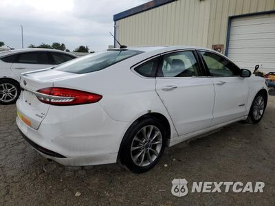 Trzecie zdjęcie samochodu z tyłu: 2017 FORD FUSION SE HYBRID VIN:3FA6P0LUXHR409340 - miniatura